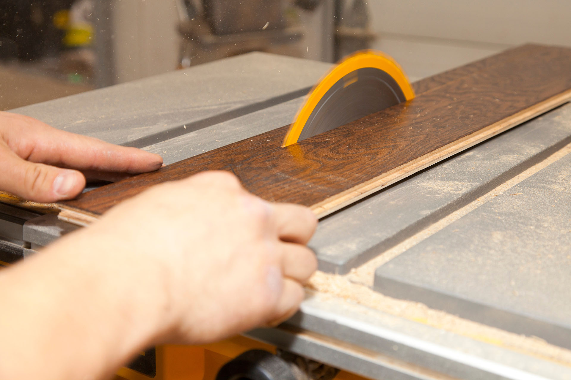 Tradesman Using A Table Saw To Cut Hardwood; St. Albert, Alberta